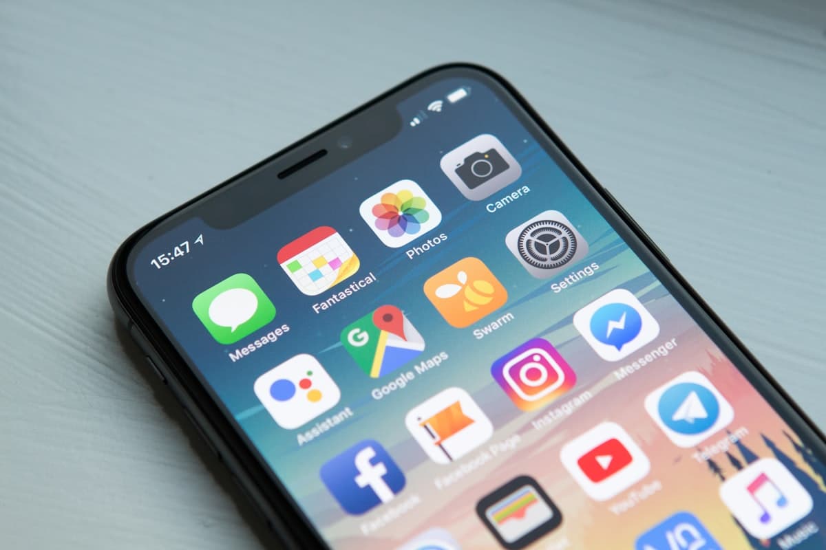 Smartphone showing messaging and contact apps used for follow-ups